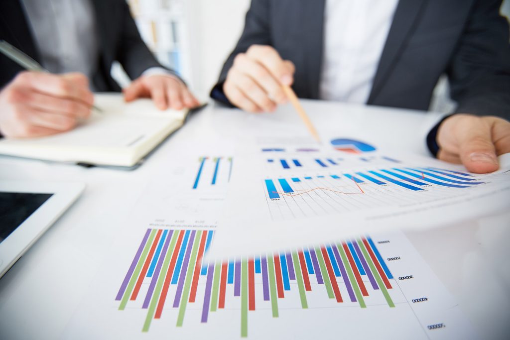 What can Management Accountant Do For Your Business? 2 two senior Accountants generating financial report for companies dissolution and liquidation in thailand