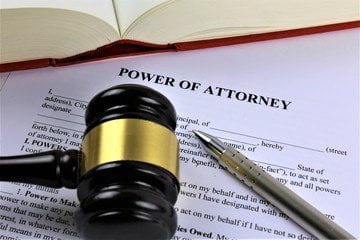 a gavel placed on Power of attorney. Power of attorney Services in Thailand