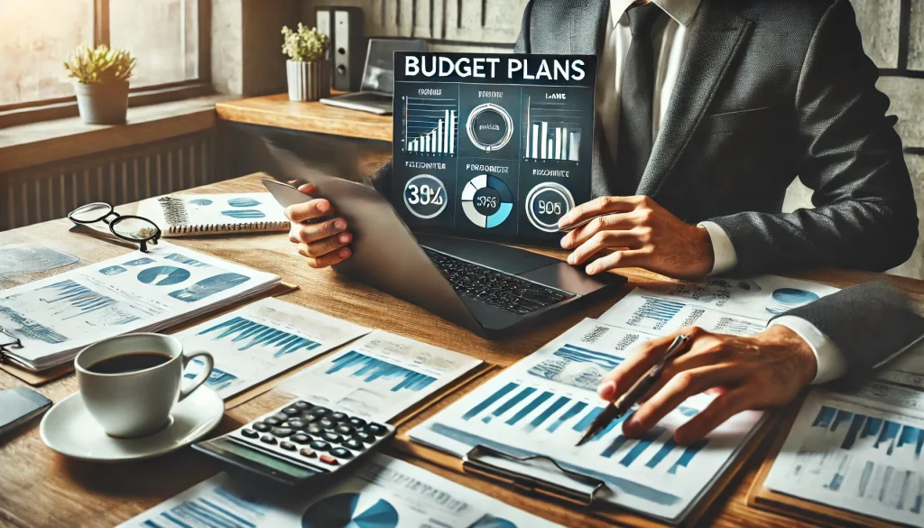 Role of Management Accounting in Decision Making 1 The Role of Management Accounting. Alt Text: A professional businessperson reviewing budget plans on a laptop in a modern office. The laptop screen displays financial charts, graphs, and performance indicators. Surrounding the workspace are documents, a calculator, and a cup of coffee, symbolizing strategic financial planning and decision-making in management accounting.